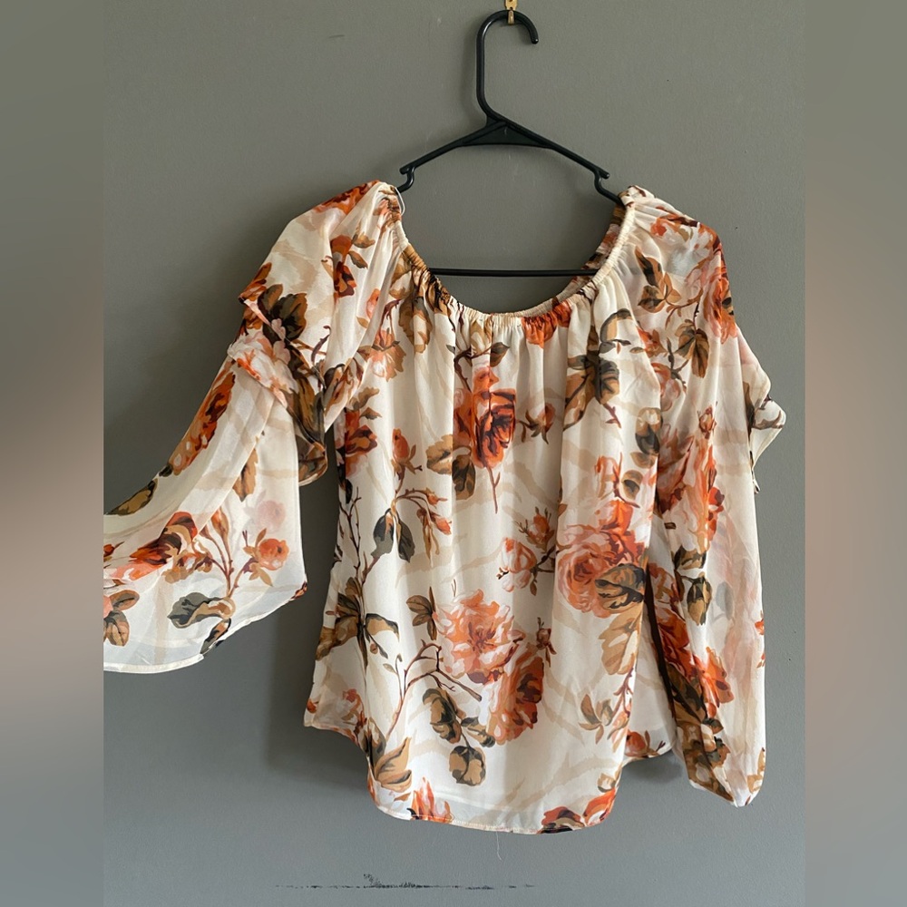 orange floral blouse